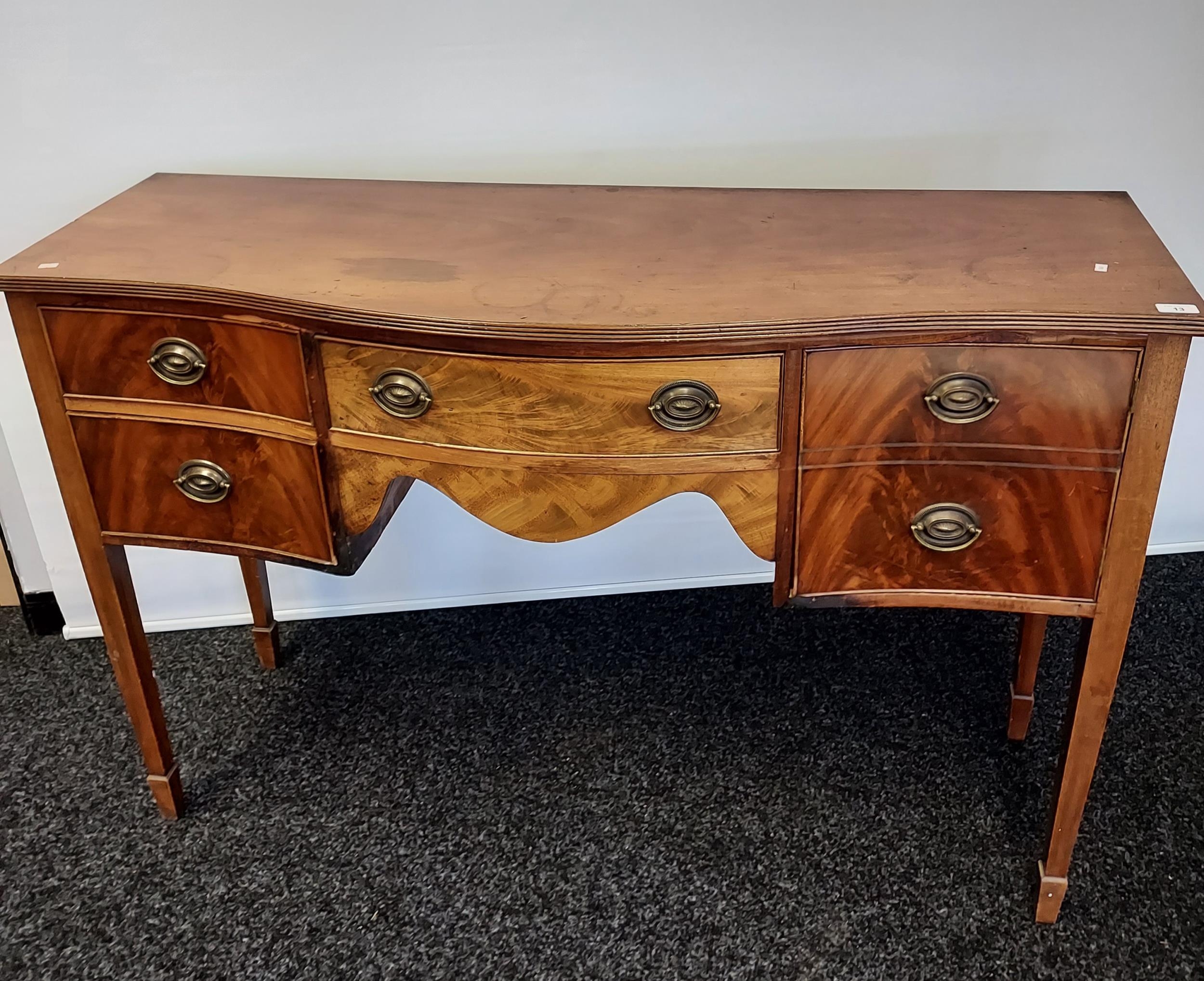 A Georgian sideboard supported on square tapered legs. [94x139x49cm]