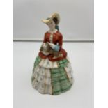 A 19th century hand painted Staffordshire lady holding a dog, preserve pot. [22cm in height]