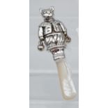 A silver baby's rattle with mother of pearl handle [14.79g]