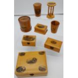 A Lot of 8 pieces of Mauchline ware to include Egg timer, money box, trinket boxes and shot glass