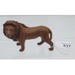 A cold painted bronze figure of a lion