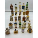 A Selection of collectable whisky miniatures to include teachers, Southern Comfort, Stewarts Dundee,