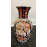 A Japanese Imari pattern scalloped effect vase. [31cm]