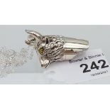 A silver whistle in the form of a highland cow [18.42g]