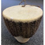 A Tribal hide made drum. [45x40cm]