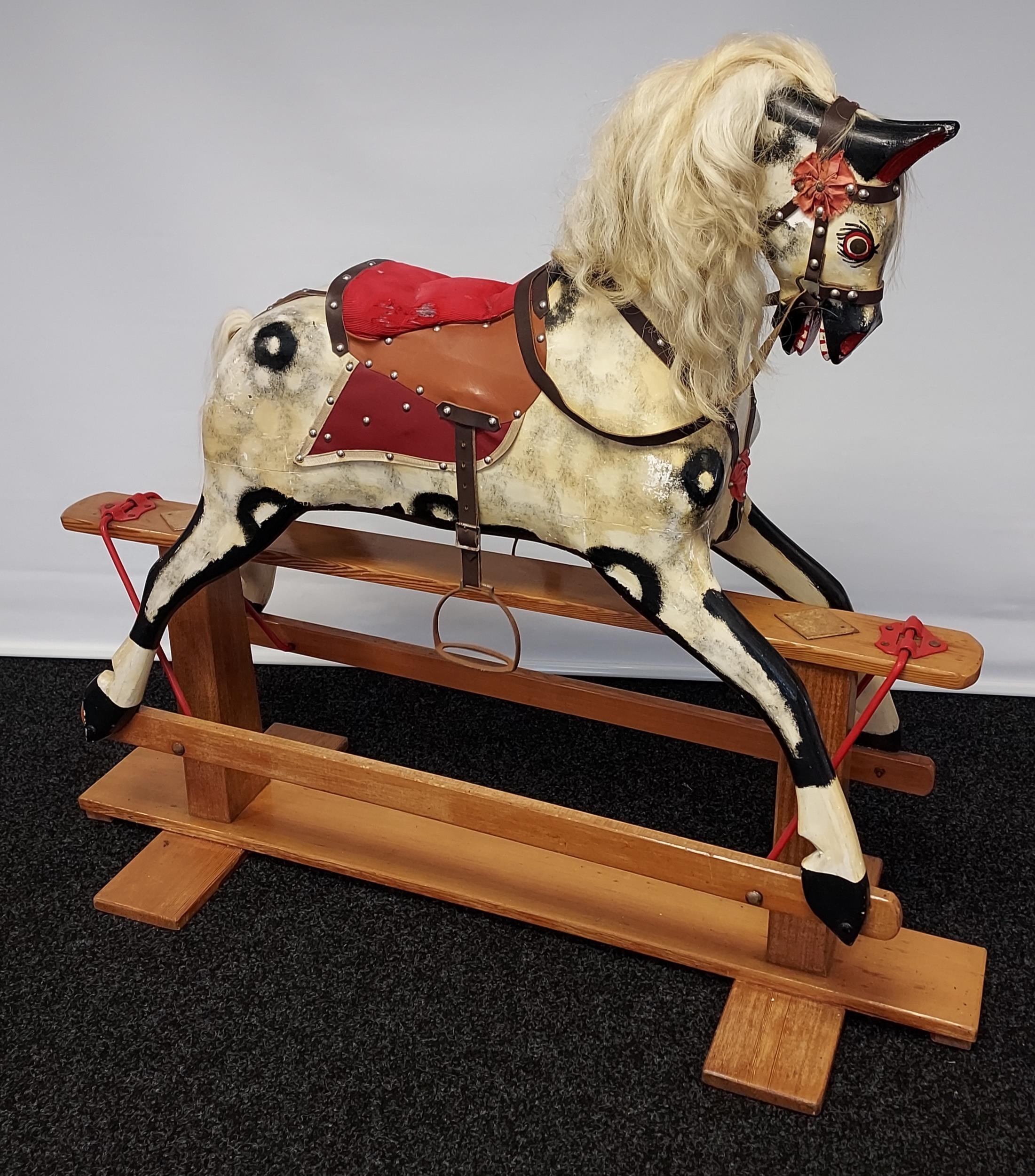 A 19th century wood and hand painted rocking horse, fitted with horse hair main and tail. [118cm - Image 4 of 8