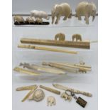 A selection of bone & ivory carved animals, glove stretcher, letter openers & chopsticks