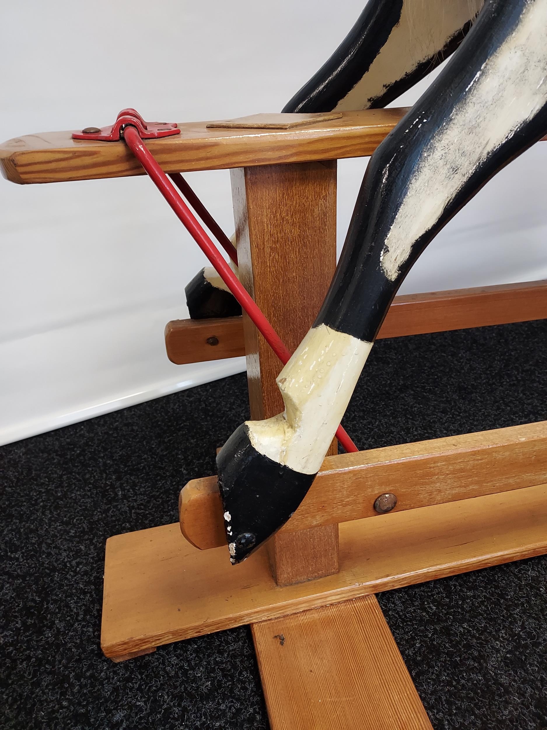 A 19th century wood and hand painted rocking horse, fitted with horse hair main and tail. [118cm - Image 8 of 8