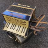 A Vintage Viceroy Junior Model accordion, Made in Saxony, Comes with travel case.