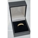 A 9ct gold engraved wedding band. [Ring size M] [weighs 1.81grams]