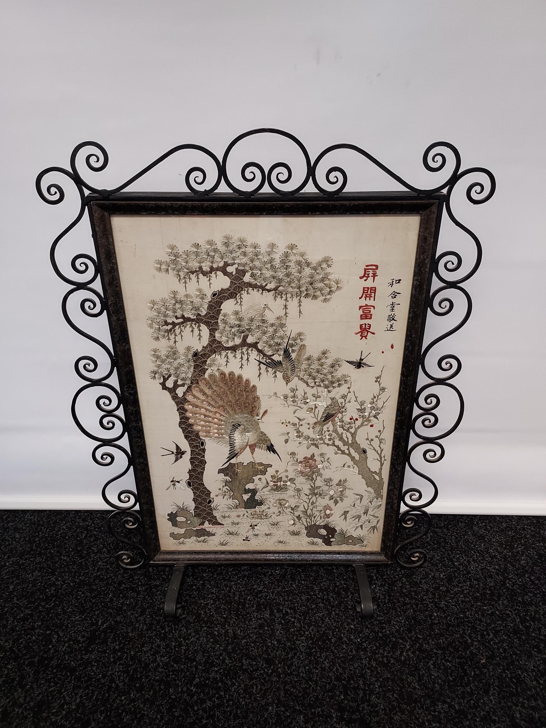 An 19th century Chinese/ Japanese silk tapestry depicting various bird flying and perched. Signed by
