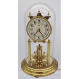 German made 'KOMA' brass and enamel mantel clock with glass dome