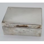 A London silver cigarette box. [4.5x12x9cm]