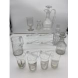 A Collection of antique etched souvenir glasses for various exhibitions, cut crystal decanters and a