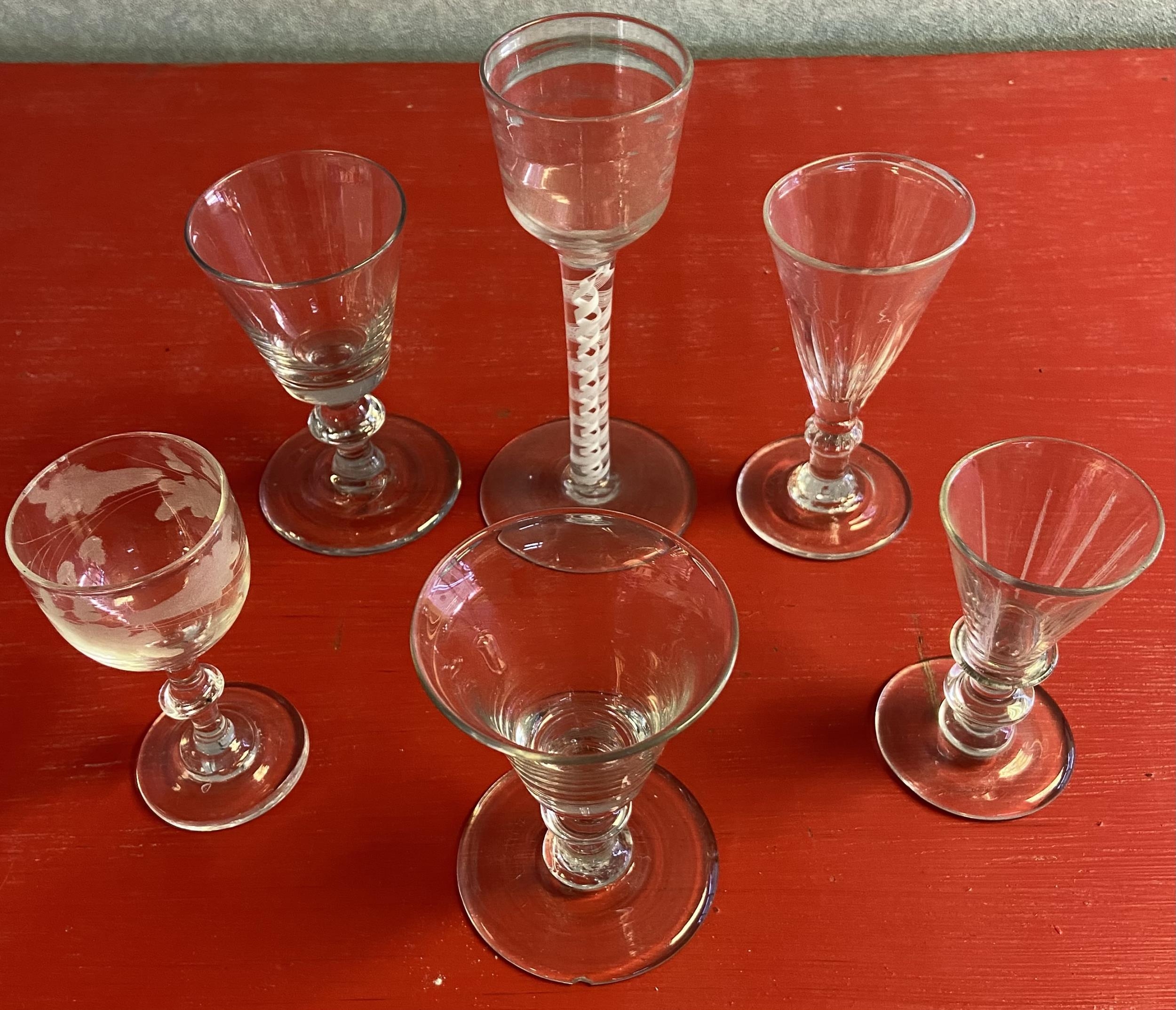 A Lot of 6 various free blown antique sherry glasses. Includes twist stem tall glass with large