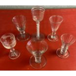 A Lot of 6 various free blown antique sherry glasses. Includes twist stem tall glass with large