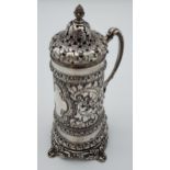 A Highly decorative London silver sugar shaker. [18cm in height] Produced by Horace Woodward & Co.