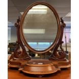 An 19th century Ornate table top dressing mirror. Has lift top compartment to the front. [