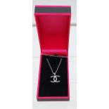 A silver & CZ Chanel style pendant necklace [3.25g]
