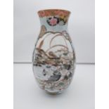 A Large Japanese hand painted panel vase, depicting various birds, flowers and village
