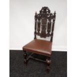 Early 19th century highly carved chair, raised on turned and block legs and supported with