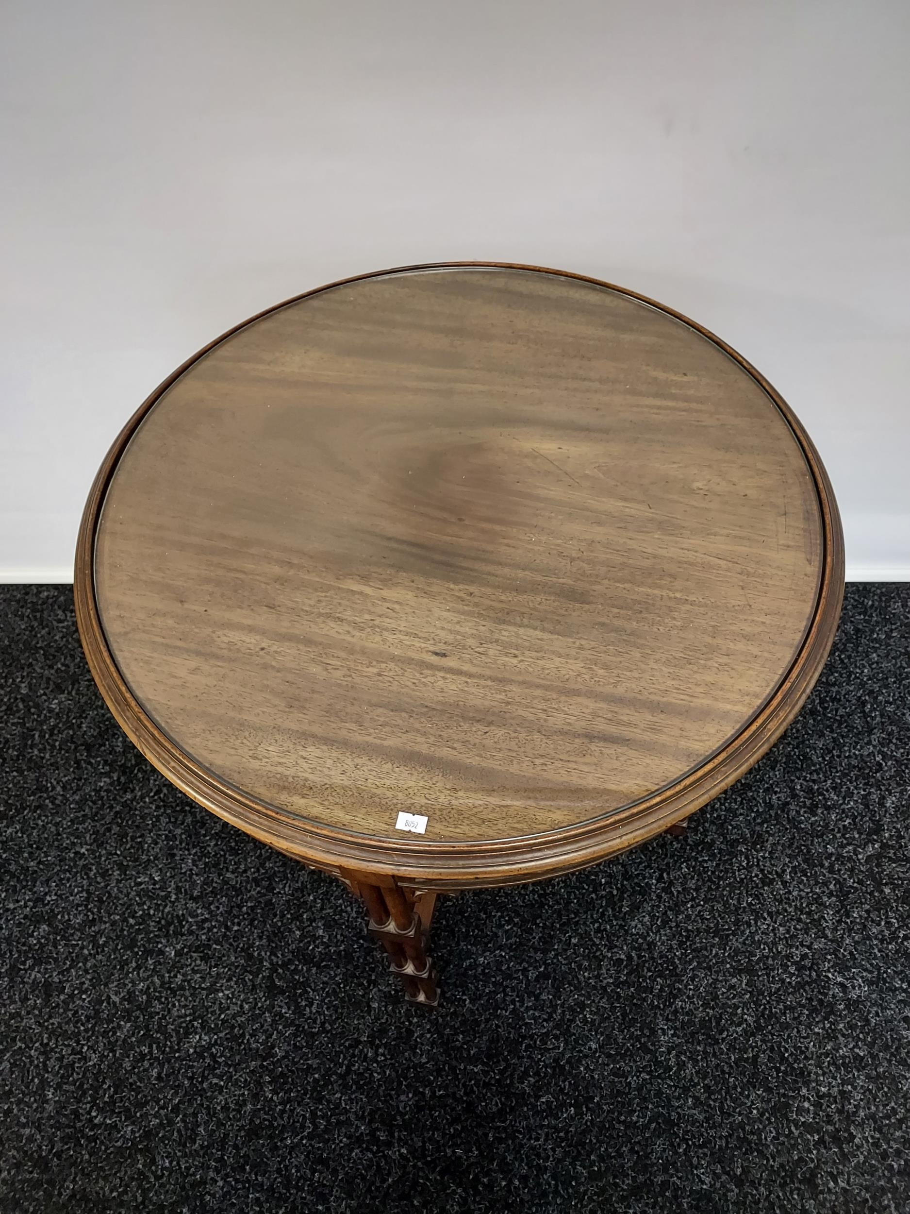 A 19th century barrel window table with glass top above a carved frieze, - Image 2 of 5