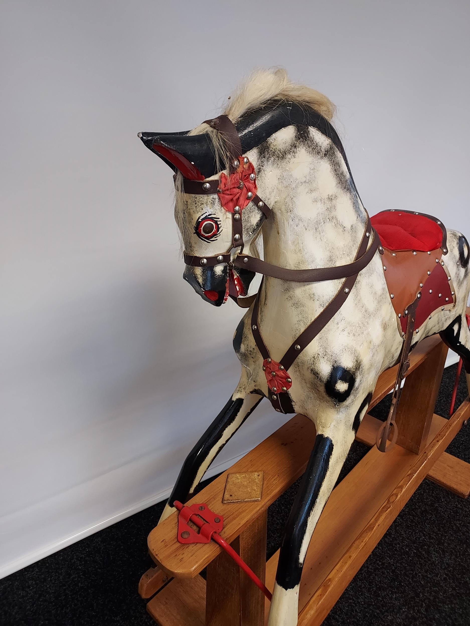 A 19th century wood and hand painted rocking horse, fitted with horse hair main and tail. [118cm - Image 2 of 8