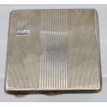 A Birmingham Silver Art Deco Design compact. [102.66grams]