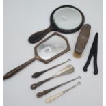 A Selection of dressing table items to include silver mirror, brush, manicure items and ebony