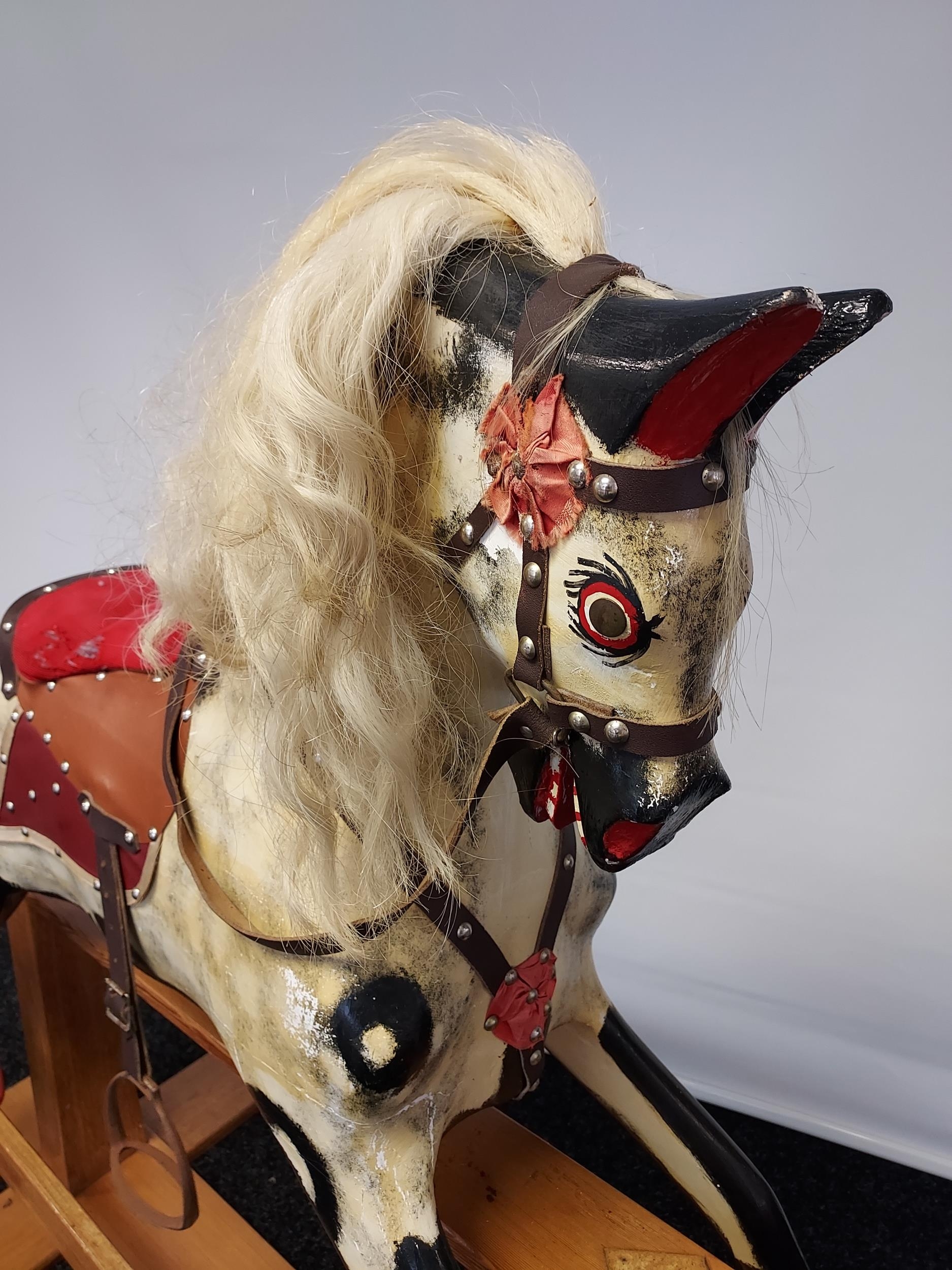 A 19th century wood and hand painted rocking horse, fitted with horse hair main and tail. [118cm - Image 5 of 8