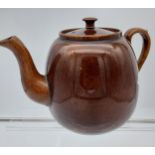 A Scottish brown glaze tea pot. [19cm in height]