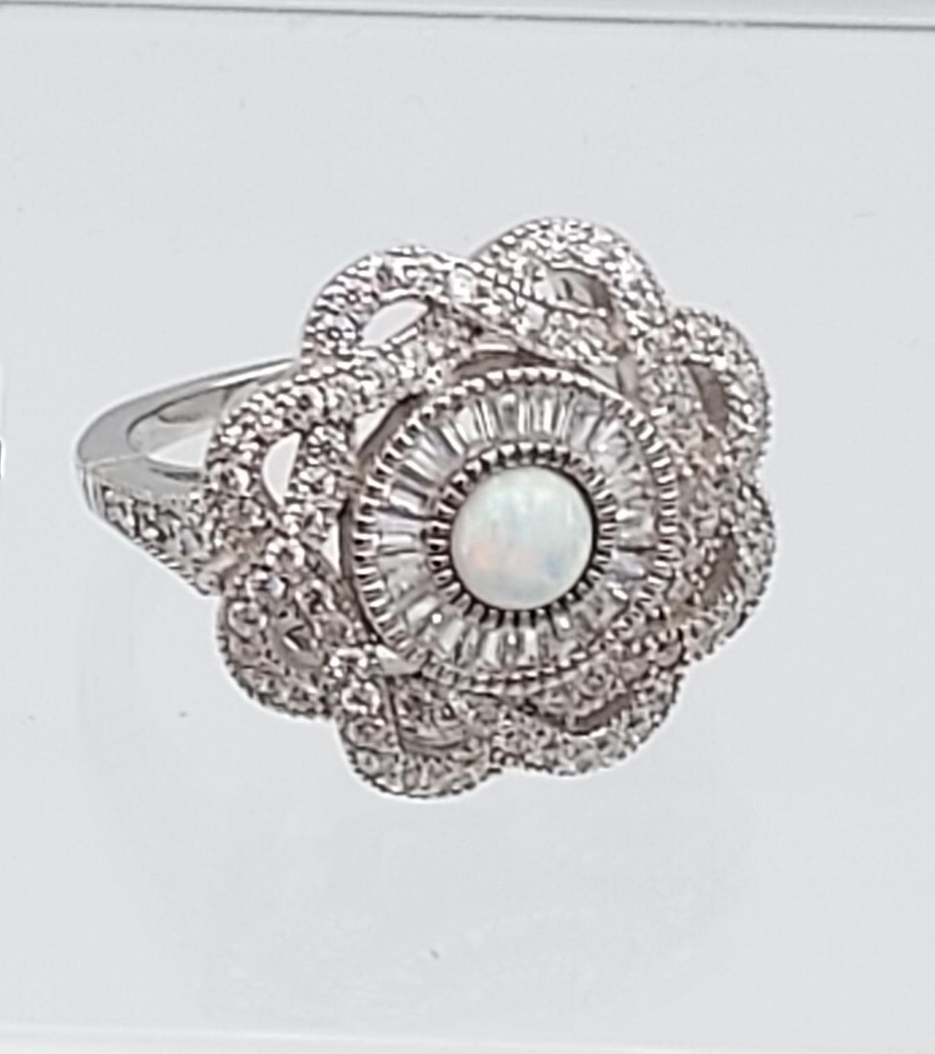 A silver CZ & opal paneled ring [7.12g]