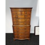 A Reproduction mahogany bow front chest on chest of drawers. [153x80x39cm]
