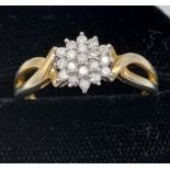 A diamond cluster ring [1.78g]