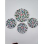 A Lot of four Chinese Qianlong marked hand painted floral design plates.