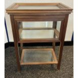 A Reproduction wood and glass section display case unit. Comes with a lift top serving tray [