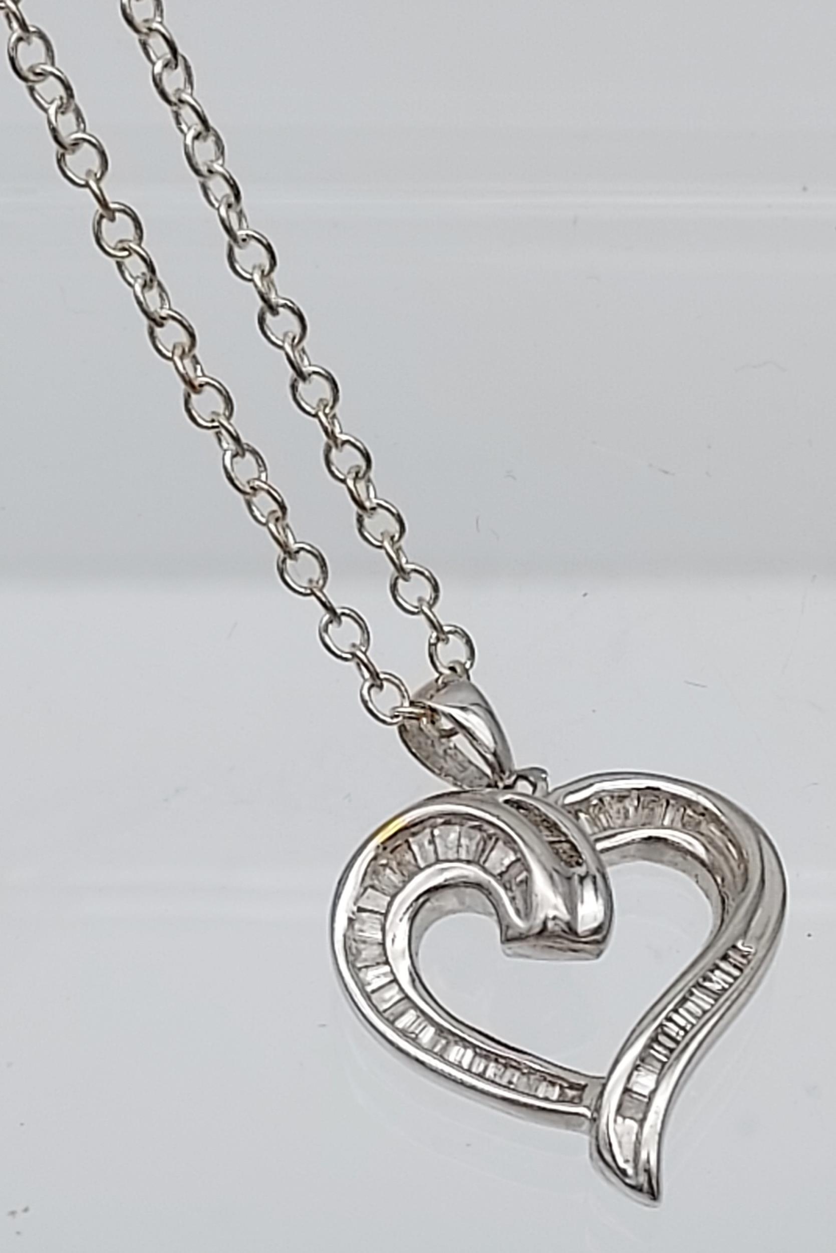 A white gold heart shaped pendant necklace set with baguette diamonds [6.12g] - Image 3 of 4