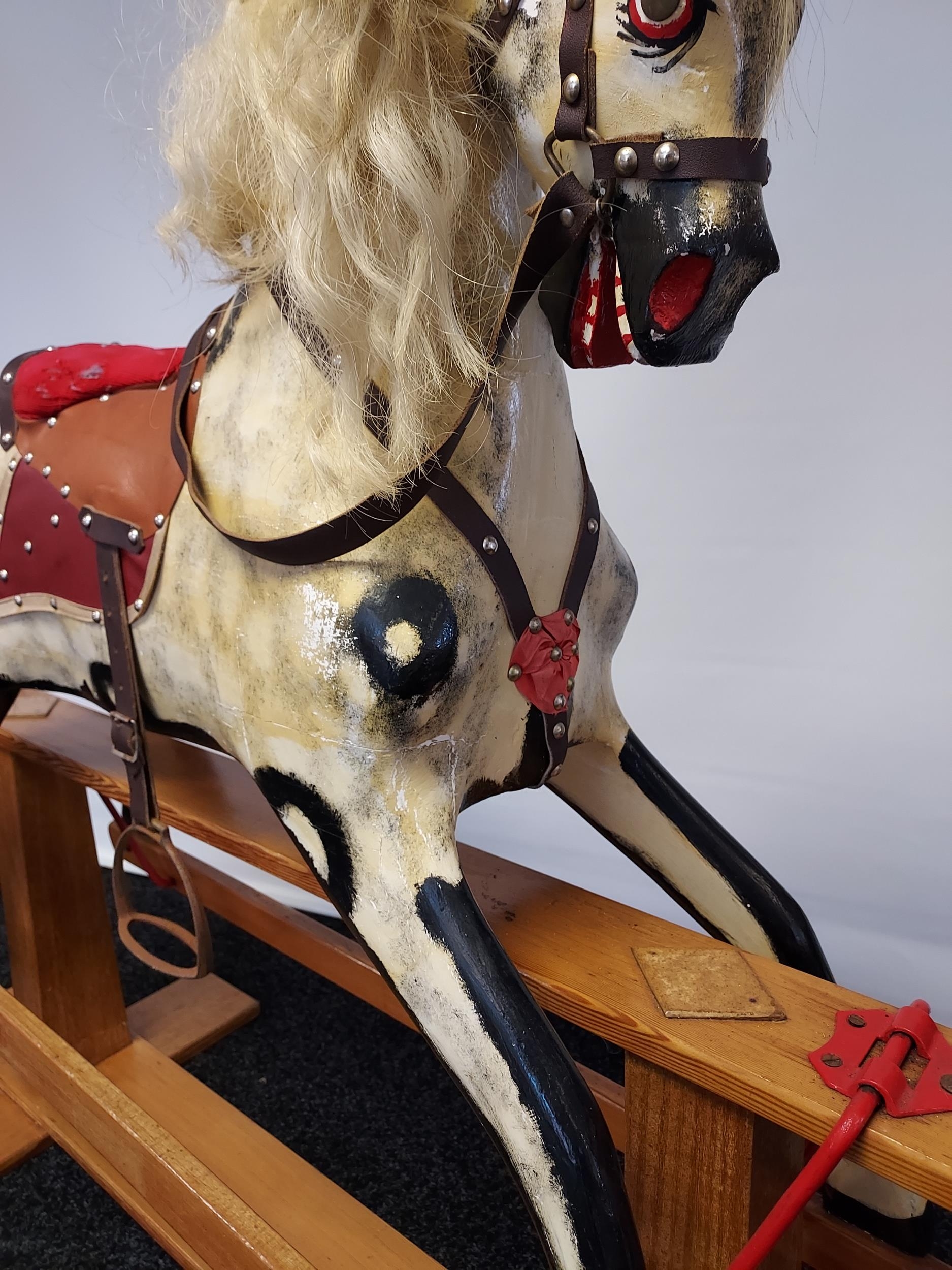 A 19th century wood and hand painted rocking horse, fitted with horse hair main and tail. [118cm - Image 6 of 8