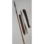 A Lot of three native weapons to include spear, jungle machete and tribal double edge sword with