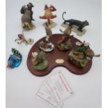 A Selection of Disney Jungle book figurines together with Danbury Mint bird figurines with