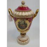 A Large 19th century European highly decorative two handle urn with lid. Detailed with two panels