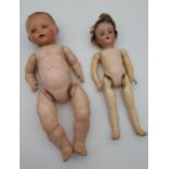 A Lot of two antique German dolls. [Baby doll- 33cm in length]