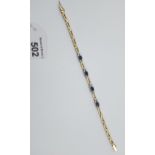 An impressive 14ct yellow gold sapphire and diamond bracelet [1.5ct approx] [12.34g]