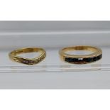 A Lot of two scrap gold 9ct gold rings. Contains diamond cluster and sapphire stones. [7.53grams]