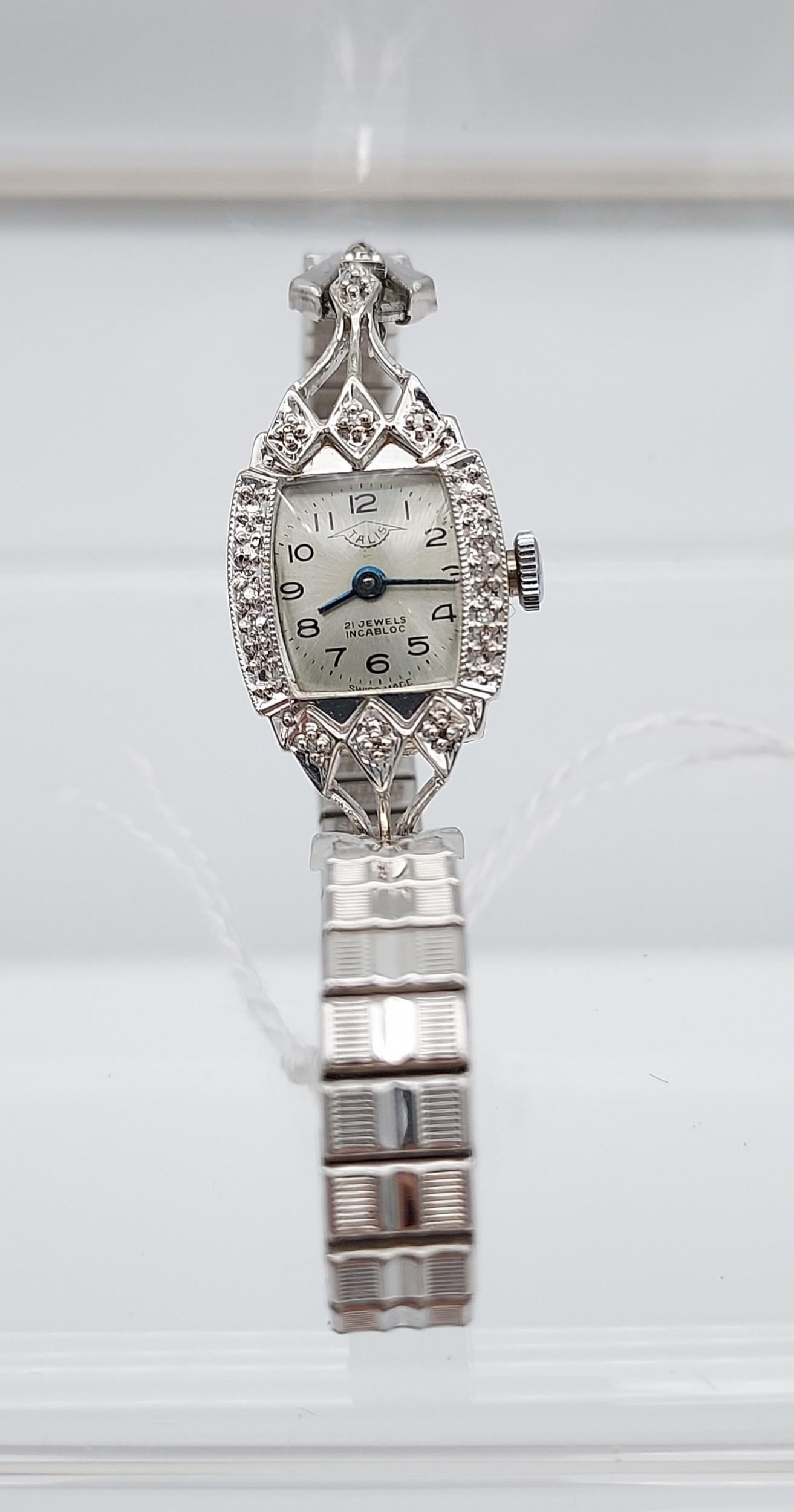 An Art Deco 14k white metal and diamond ladies wrist watch produced by Talis, 21 jewels Incabloc. - Image 2 of 4