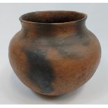 An African tribal clay pottery water urn. [31cm in height]