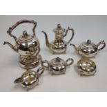A Six piece silver on copper tea/ coffee service with a spirit kettle