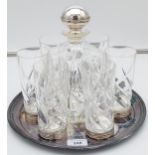 Crystal decanter with a 800 grade silver stopper, with 6 matching drinks glasses with silver