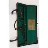 Antique Army & Navy Co-operative society Ltd Gun case with gun cleaning rods.