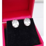 A pair of substantial silver CZ stud earrings [10.0mm in length]